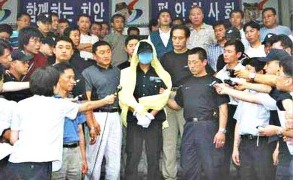 他是韩国史上最残忍杀人魔 埋的尸体一排排编号…(组图) - 10