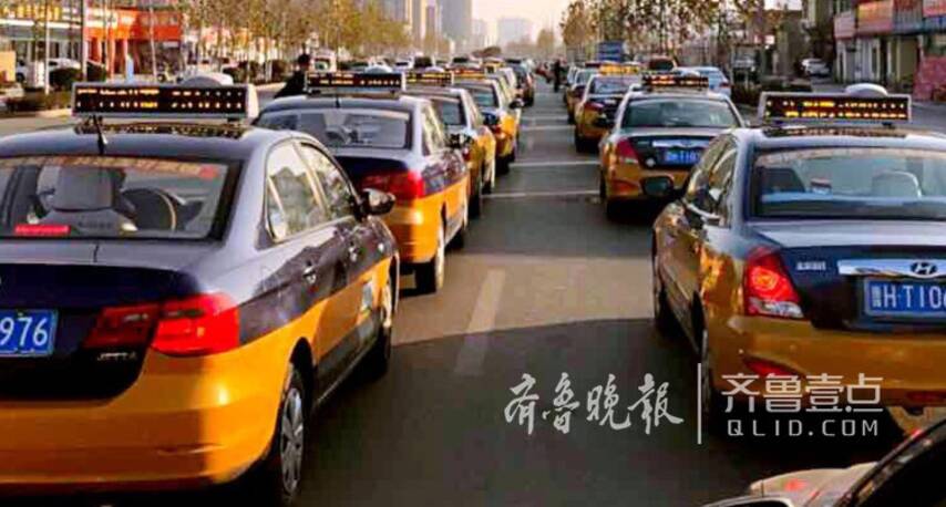 济宁出租车排队近600米 只为等气!