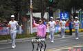智能导盲犬亮相杭州亚残运会火炬传递
