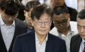 李在明已接受两个多小时审查,全程无言、默默观看双方“攻防战”