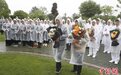 吴孟超逝世两周年 家人、学生、同事雨中墓园缅怀