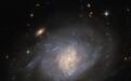 哈勃分享NGC 941螺旋星系新图:业余天文学家发现的超新星成焦点