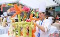 紫薯成“月季”、豆腐雕“芍药”:粤菜师傅一刀一划呈现“百花宴”