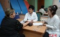 中医义诊走进哈萨克斯坦首都 民众排队体验中医药文化