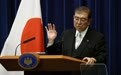 发放“商品券”惹争议 日本首相深夜道歉