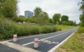 120米坑洼砖路变沥青路,东西湖区金山大道“骑”乐无穷