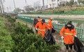 清沟护渠换新颜,长青环卫公司守望一渠清水