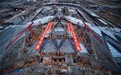 上海建工以数智化技术攻坚浦东机场T3“钢铁之翼”: 6千吨钢屋盖16米精准提升