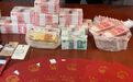 奢侈品多到放不下,还有10本房产证......警察抓获“最壕”嫌疑人