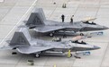 对抗中国？美军25架F-22“猛禽”隐身战机齐聚关岛