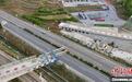 全国首座跨铁路公路双转体曲线铁路桥梁转体成功