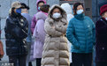 气温降至零下 沈阳市民在寒风中做核酸