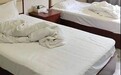 安徽一女子住酒店退房时将毛巾浴巾拖鞋水壶装走,酒店回应