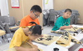 笔尖上的“国潮”,劳动社区开展儿童毛笔书法体验课!