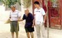 河南103岁乞讨老人被接回家 曾讨钱为儿子盖两层楼(图)