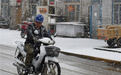 中国最北黑龙江漠河县四月飘雪 边防官兵冒雪巡护