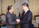 习近平会见老挝人革党前总书记、前国家主席朱马里