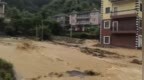 勸群眾轉(zhuǎn)移過程中,，浙江一村干部不慎落水失聯(lián)