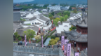 慈城雙節(jié)“煙火氣”里的“志愿紅”：日均700小時服務(wù)暖了游客心