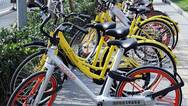 四问共享单车押金：该不该收？无条件免押金真的可行？