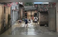 水患下的广东英德：有人宁可被水围困在停电的家里，也不愿意离开