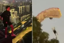 男子在楼顶跳伞