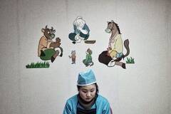 外媒摄影师镜头下的朝鲜姑娘