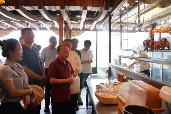 区工商联及市场监管局就厨房革命工作赴北京