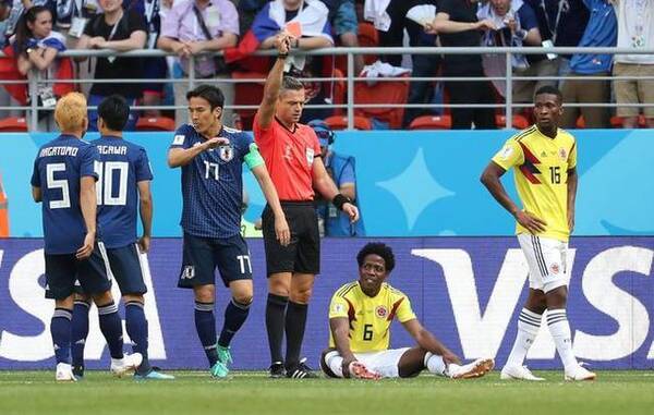 哥伦比亚球员手球红牌罚下成输球罪人,世界杯