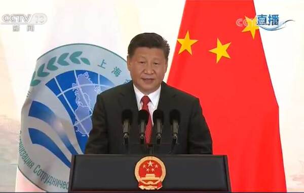 �����������ƶ���������2018��6��9�������Ϻ��ൺ��Ỷӭ������ൺ���ʻ������ľ��С�ϰ��ƽ��ϯ��ӭ��Ტ�´ǡ�