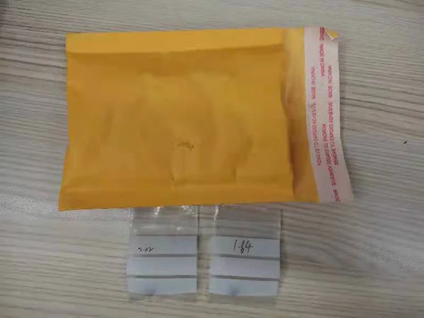 裝有2顆紅寶石的牛皮紙袋被扔進垃圾桶,上海民警為失主尋回 第2張 裝有2顆紅寶石的牛皮紙袋被扔進垃圾桶,上海民警為失主尋回 第2張