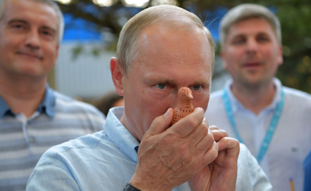 普京“卖萌”一幕|组图