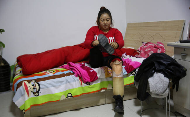 曾8次自杀的她如今带领残疾人致富