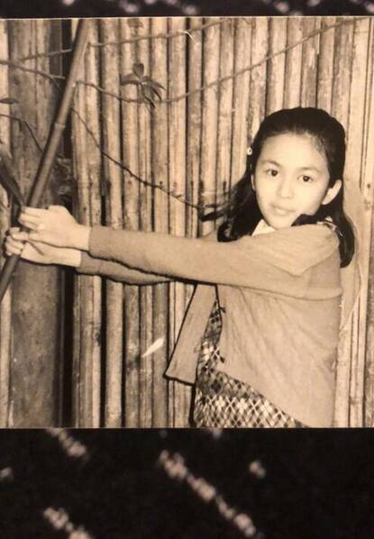 金莎童年照.
