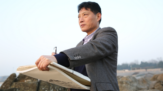 中国画海洋画派创始人——丁万里