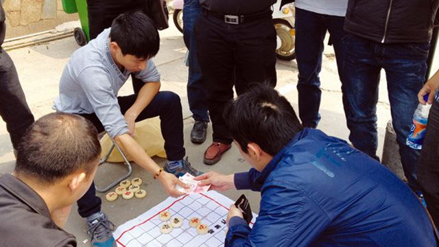 为什么说看到街上摆象棋残局摊千万别去围观