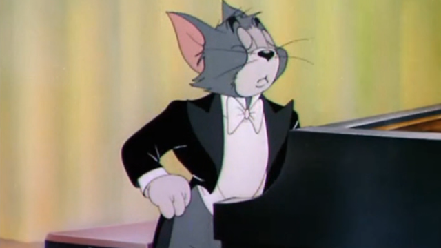 猫和老鼠汤姆认真弹钢琴的样子好帅一副看不起人的表情