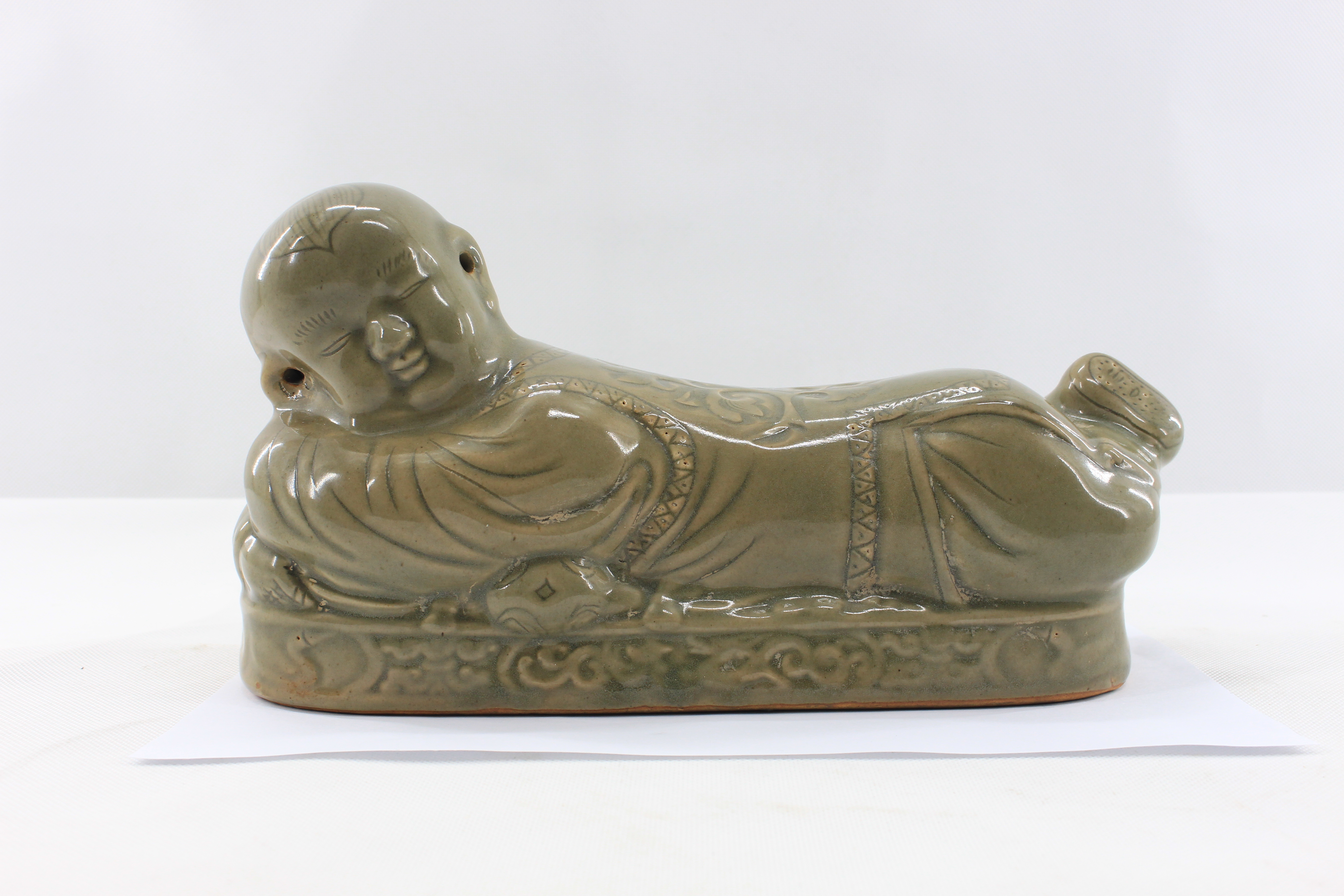 宋瓷之美----耀州窑剔花孩儿瓷枕__凤凰网