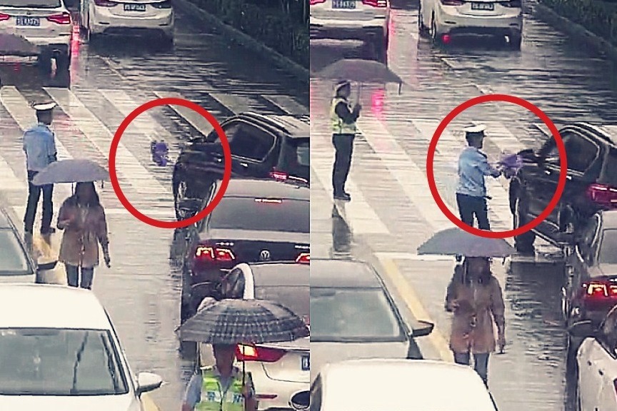 暖！实拍：河南交警被市民“霸总”式宠爱 雨中“硬核”送伞