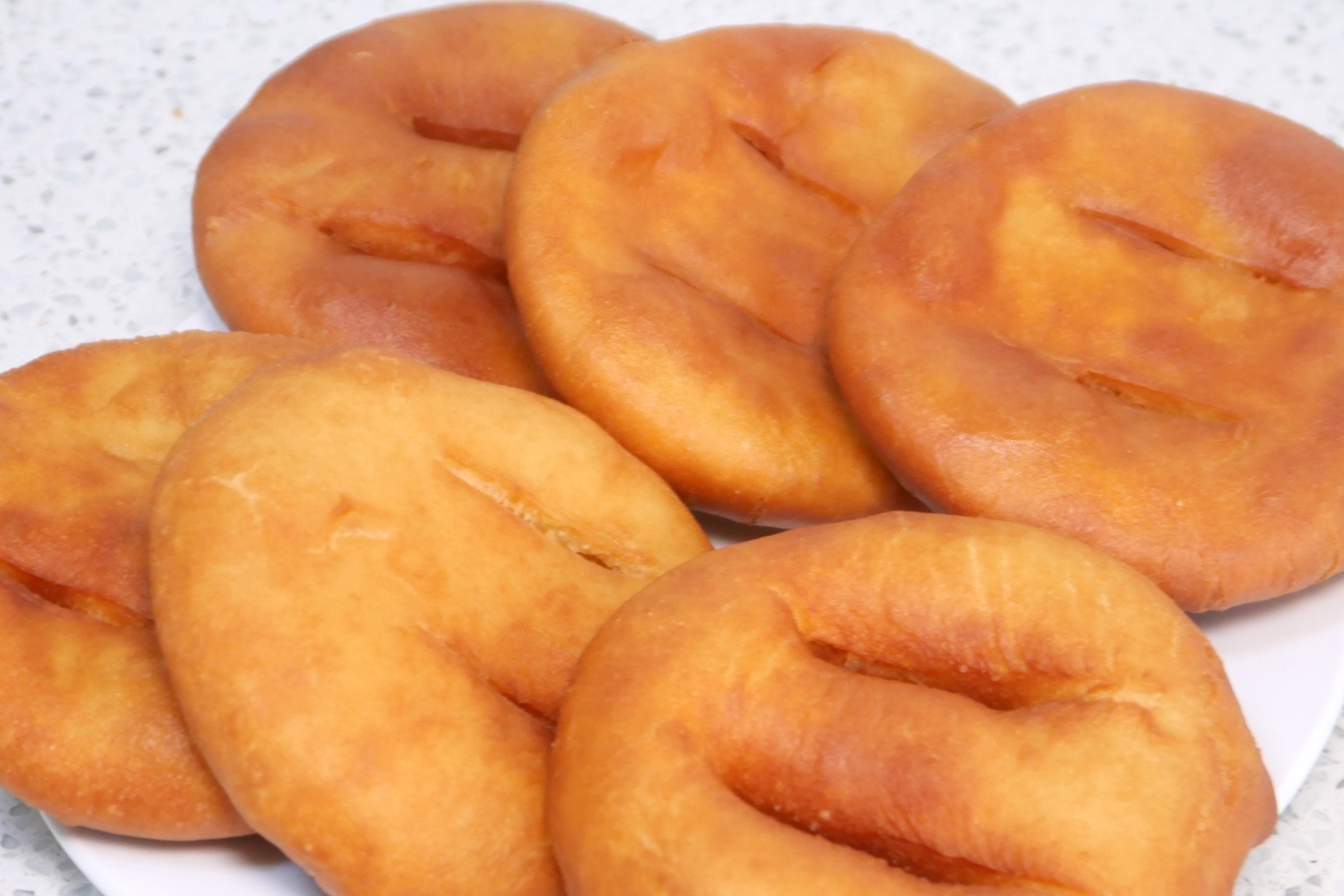 炸油饼,放半个月都不硬,关键在和面,蓬松酥软吃不够