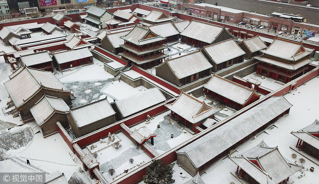 航拍雪后沈阳故宫