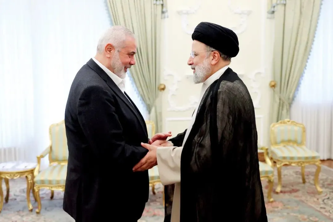 3月27日，伊朗德黑兰，伊朗总统莱希（右）会见哈马斯领导人哈尼亚。图/视觉中国