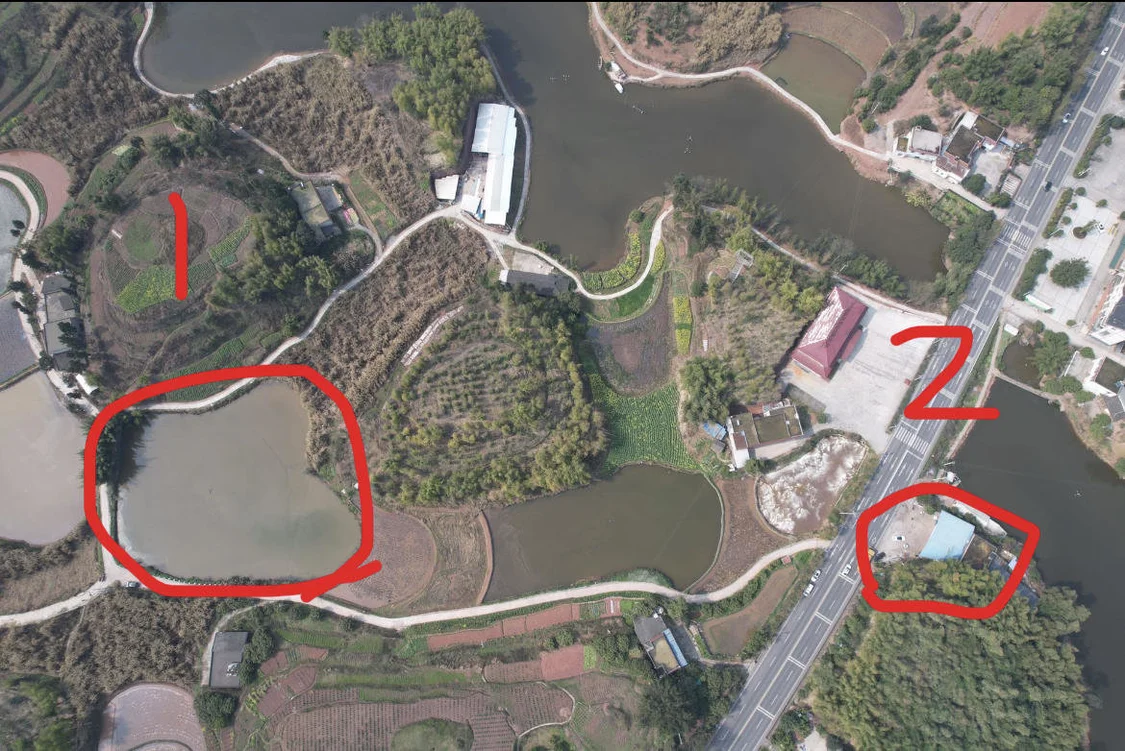 图1处为廖某某鱼塘;图2处是廖某某家。