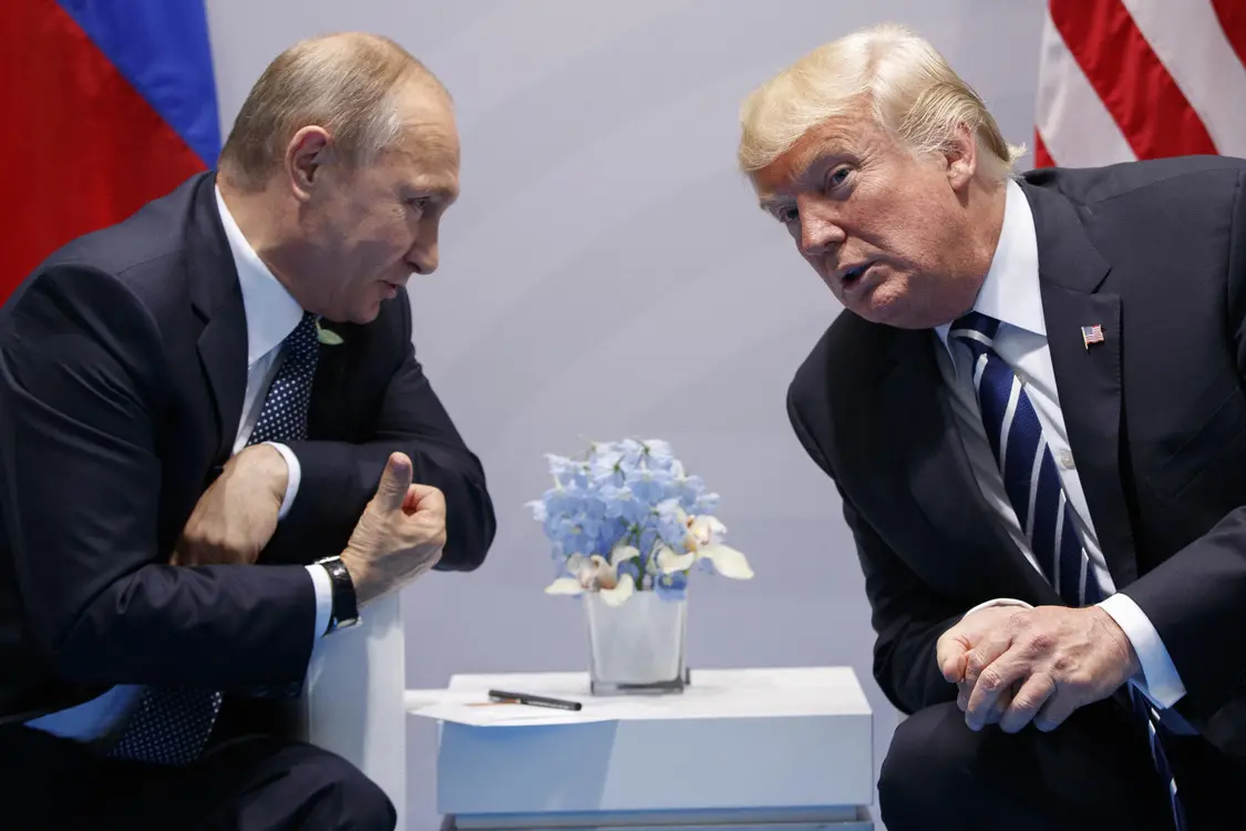 ʱ201777գ¹g20ϣͳջ˶˹ͳվվںն״λ档ڱʼйض˹Ԥ2016ѡָʱЩָأʾվϵ̬ȷǳǿӲFILE - U.S. President Donald Trump meets with Russian President Vladimir P.jpg