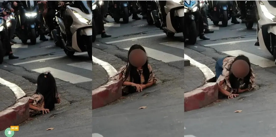 ▲女子被拍到从下水道排水孔处爬出