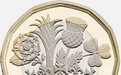 旧版一英镑硬币退出流通 英国民众“花钱忙”(图)