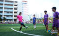 女足韦海英等“铿锵玫瑰”进校园 助力校园足球力量成长(图)