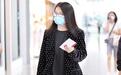 李湘发福胖出新高度？现身机场似霸道女总裁，老公贴身跟随