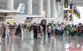 广州白云国际机场连续两天客流突破20万人次 创年内新高