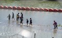 墨西哥称美墨边境“浮墙”处发现尸体，得州反移民政策再惹争议